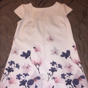 White top and floral bottom dress. Great condition